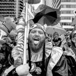 500px Photo ID: 1008986641 - Froggy Carr wenches salute to Gritty. New Years Day Mummers Parade in Philly 2020 Gritty is the official mascot for the Philadelphia Flyers National Hockey League (NHL) team. He is a 7-foot (2.1 m) furry orange creature with go Stacey Lewis / 500px Cyber-shot DSC-RX100 III 2020-01-01 10:20:34 Stacey Lewis / staceyelle / 500px f/4 1/250sec ISO-160 8.8mm Horizontal (normal)